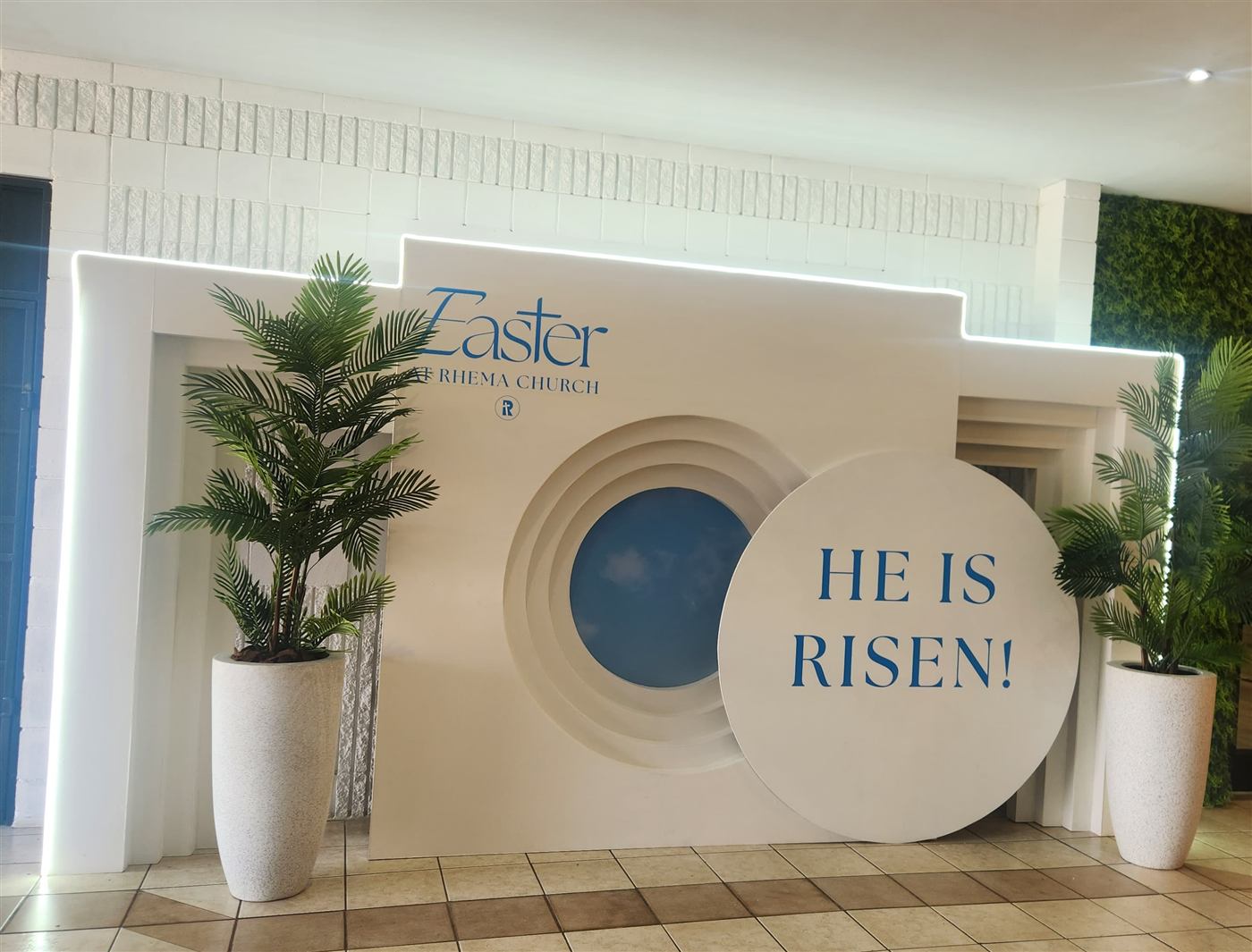 Easter at Rhema Church He Is Risen lobby backdrop