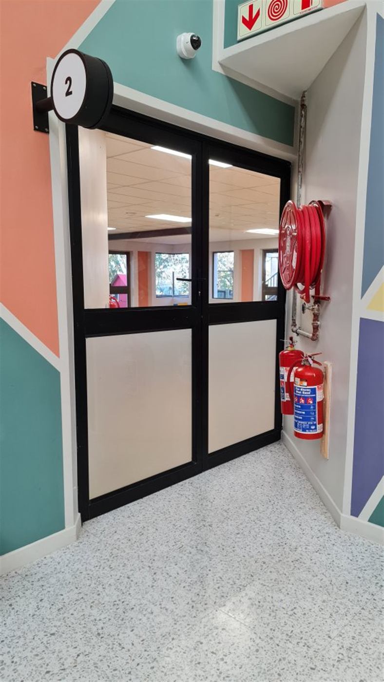 Interior wayfinding and door numbering signage
