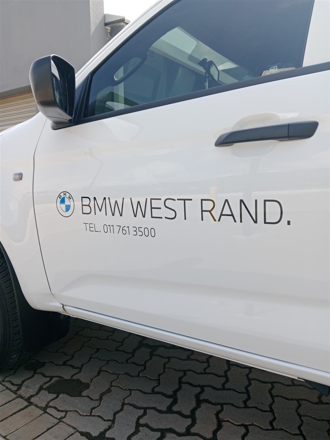 BMW West Rand canopy bakkie door decal close-up