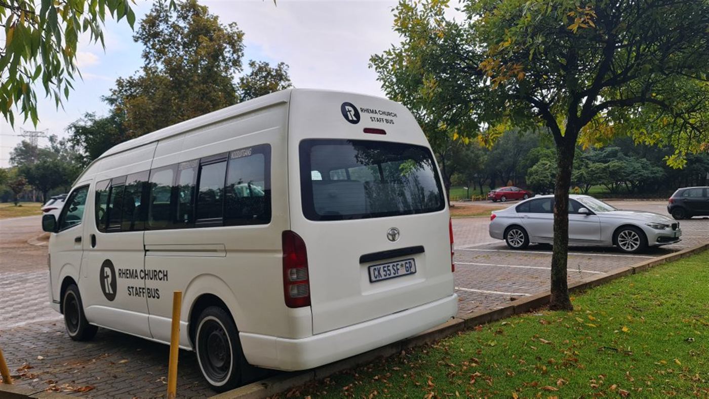 Rhema Church staff bus rear three-quarter view